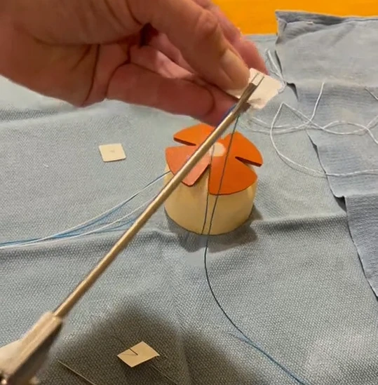 Loading ROTIUM onto sutures